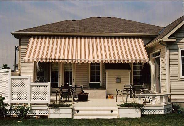 striped awning over a deck
