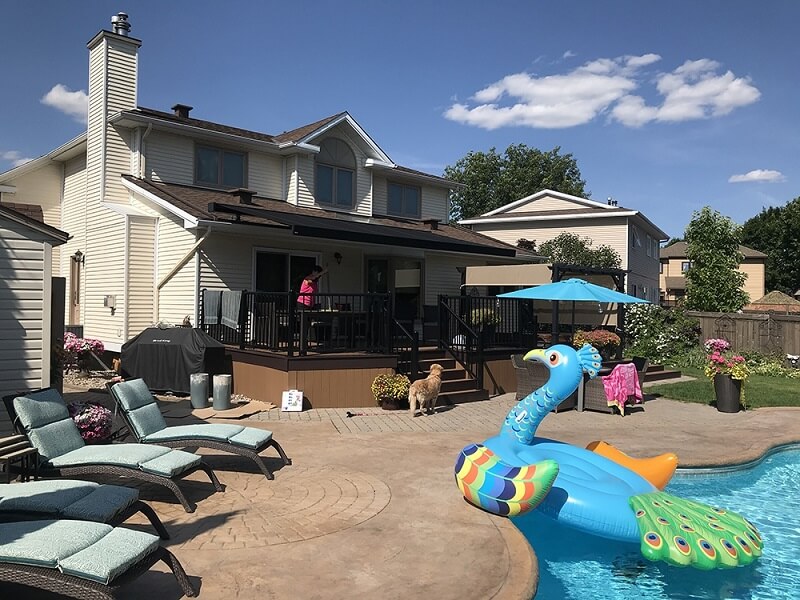 motorized awning by pool