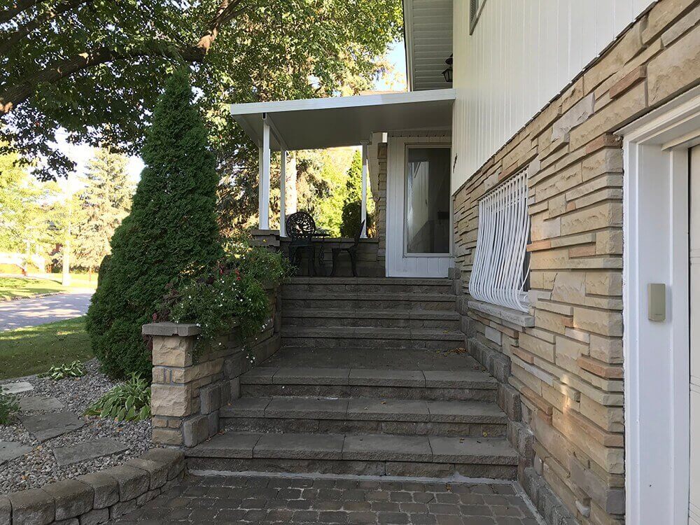 aluminum patio cover over a natural stone patio